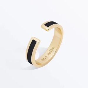 Black and gold ring